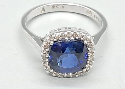 9ct white gold and synthetic blue stone