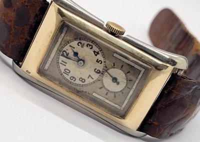 Rolex R.E.F 1490 1930s gold and stainless case (working)