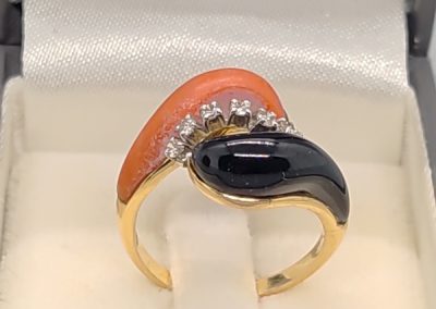 14ct gold, coral, onyx and diamond ring