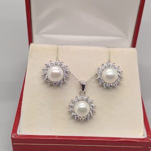 Sterling silver, cultured pearl and cubic zirconia earrings, pendant/chain and ring set