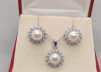 Sterling silver, cultured pearl and cubic zirconia earrings, pendant/chain and ring set