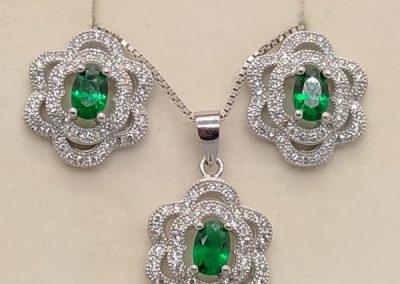 Sterling silver and green cubic zirconia chain and earrings